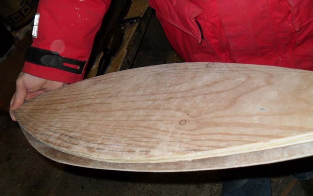 Douglas compares templates and one of the hulls. Photo: SR